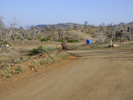 After selecting site 22, I ride through the deserted Mid Hills campground back to the entrance kiosk to deposit my fees