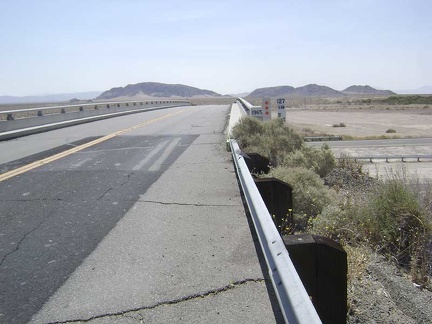 Leaving Baker, the 10-ton bike and I cross the I-15 freeway and head toward Mojave National Preserve