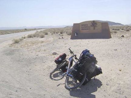 A quarter mile or so beyond the freeway crossing, I reach the Mojave National Preserve entrance marker and leave the past behind
