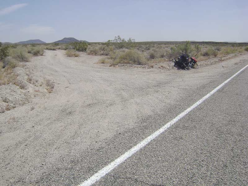 Almost 13 miles up Kelbaker Road, I stop briefly at the rough dirt road to Indian Springs, Mojave National Preserve