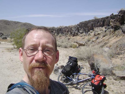 Time for a break: I pause for a Clif bar at Black Tank Wash along the lava flows adjacent to Kelbaker Road