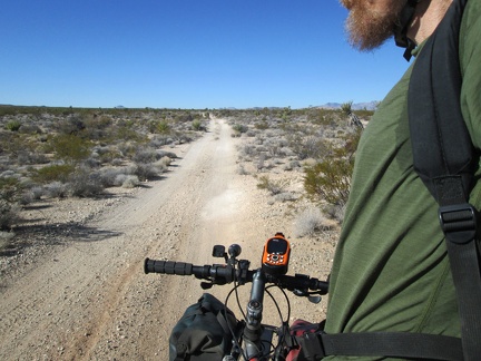 I ride around a corner and discover more solid road surface on the old Mojave Road ahead