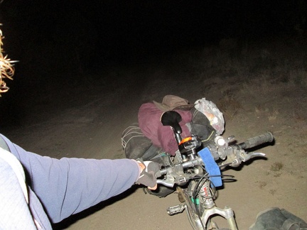 In less than an hour, I complete the gentle climb to the top of Ivanpah Road (4900 ft elev.); I stop to change my GPS batteries