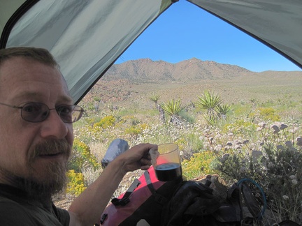 I enjoy cold coffee and eat breakfast while packing up to leave Ivanpah Valley