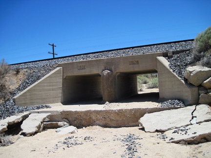 The double culvert under this trestle along Brant Road near Cima bears two different date inscriptions