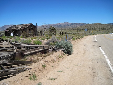 I start the 1.5-mile ride up Cima Road to the powerline road, passing an abandoned house on the way out of &quot;town&quot;