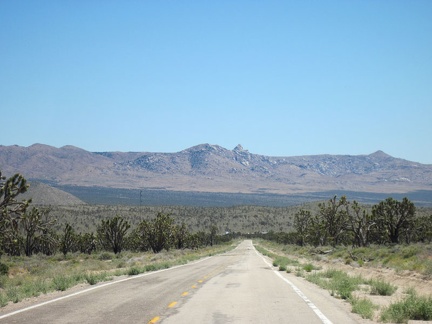 Before turning off at the unpaved powerline road, I take a look behind me back down toward Cima