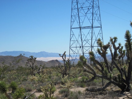 I zoom in past the transmission tower for a closer view of the Kelso Dunes