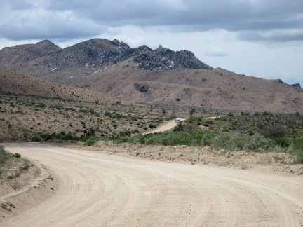 Riding west on Cedar Canyon Road, I get views of the Eagle Rocks area from down below