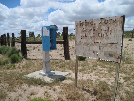 Outside the Cima Store is a pay phone and a very worn sign telling us to preserve our desert (good message)