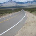I pause at the end of Morning Star Mine Road to look east up Ivanpah Road into the New York Mountains