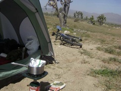 I heat up a boil-in-bag Indian-style breakfast, happy that my tent survived last night's wind storm
