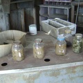 Pickles! In addition to some old paint cans and wood trim pieces, some old bottles of home-made pickles are in the shed...