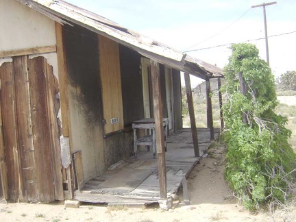 The decaying front porch of Death Valley Mine house #2