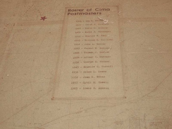 Mounted on the map is a roster of the postmasters of the Cima post office here since 1905, printed by typewriter
