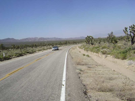 After the big curve coming up, the fun hill down Morning Star Mine Road will begin