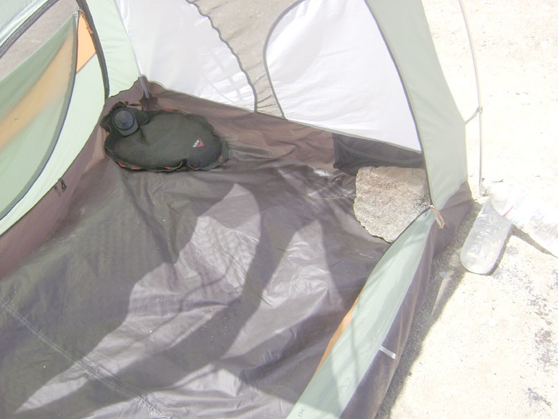 The last items to be removed from the tent are a big rock and my water bag