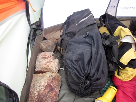 The wind has picked up again, so I place large rocks inside my tent before leaving on today's hike