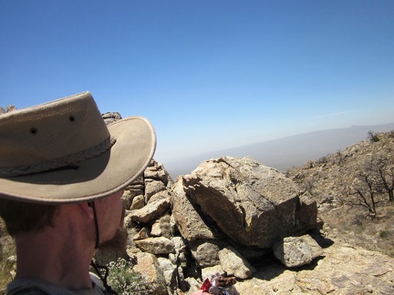 I take an energy bar (mmm, chocolate) break behind a boulder pile; it's really windy up here at 6015 feet elevation