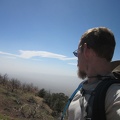 It's a clear sunny day above the smog layer that's blowing across the Ivanpah Valley below