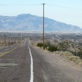 I begin the slight downhill on old Route 66 into the town of Newberry Springs, with the Newberry Mountains in the background