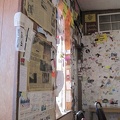 Bagdad Café: I begin to notice that most of the business cards and other paraphenalia on the walls are from France