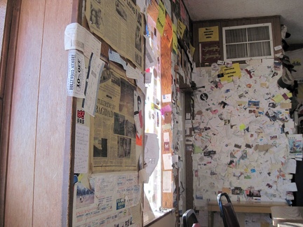 Bagdad Café: I begin to notice that most of the business cards and other paraphenalia on the walls are from France