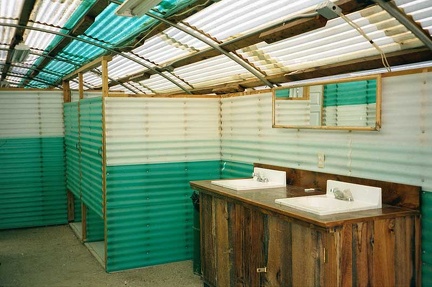 Inside the rustic Nipton shower building, dirt floors and all!