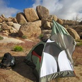 My tent threatens to blow away while I pack it up one last time (until the next trip, of course)