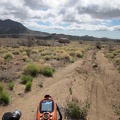 I leave my Pinto Valley campsite at 5650 feet elevation and start coasting down Howe Spring Road around 9h