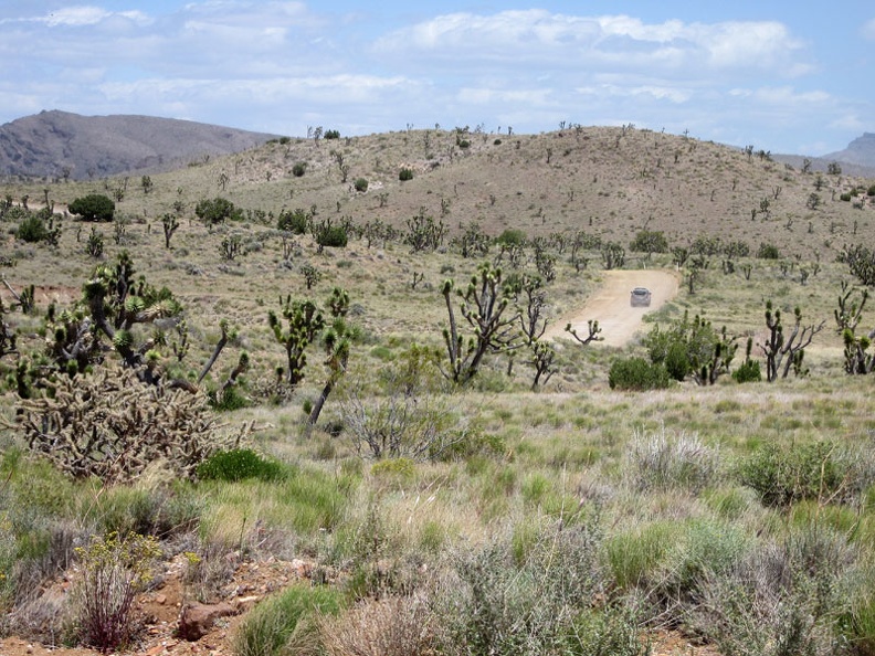 A couple of cars pass me along Ivanpah Road