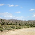 I return to the task of riding back to Primm, Nevada and have views of the Castle Peaks from this part of Ivanpah Road