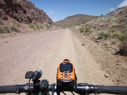 This segment of Ivanpah Road follows the old railway grade from 100 years ago, and thus cuts right through the hills