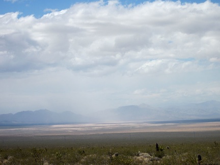 Hmmm... it looks like some light rain is falling further over in Ivanpah Valley