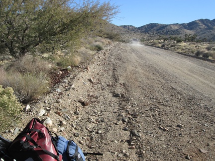 After our hearty chat, Ken drives away and I remount the 10-ton bike for the ride down Ivanpah Road on my way to Nipton