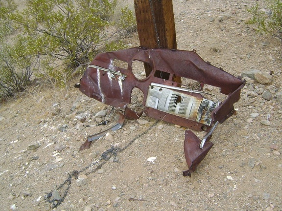 Further beyond, I stumble across what appears to be part of an old automobile dashboard