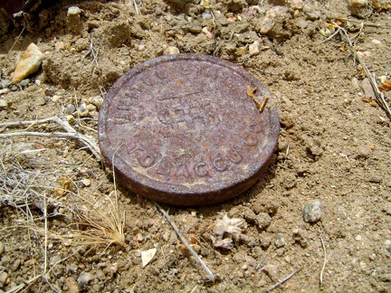 Here's an old rusty lid from a tobacco tin, perhaps Copenhagen snuff