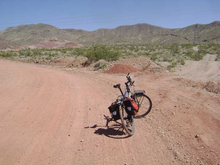 I see that I'm approaching a mining area with red soil that is not on my map and may still be active