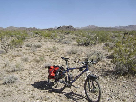 A little further down the power-line road, a distant black hill gets my attention