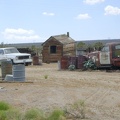 More old motor vehicles, and another crooked shed, behind the Cima Store, Mojave National Preserve