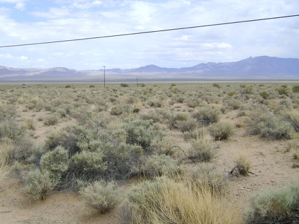 Crossing the floor of the Ivanpah Valley on Nipton Road, I stop for a very short break to take in the scenery