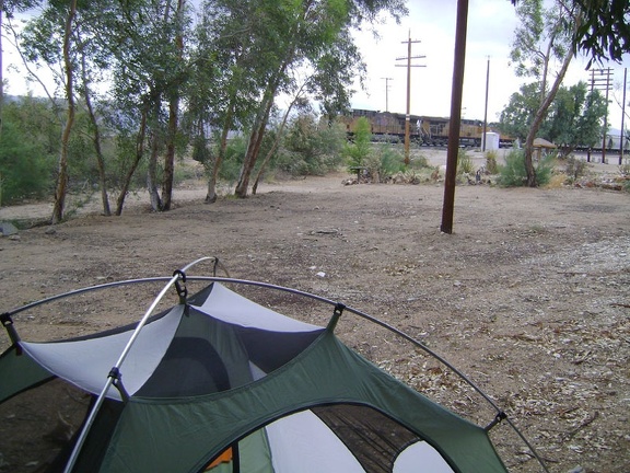 While setting up my tent under the eucalyptus trees just south of the Nipton store, a train rushes past