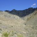 On the way down to Pachalka Spring Road, I see a faint road rising up a steep hill toward an old mining area