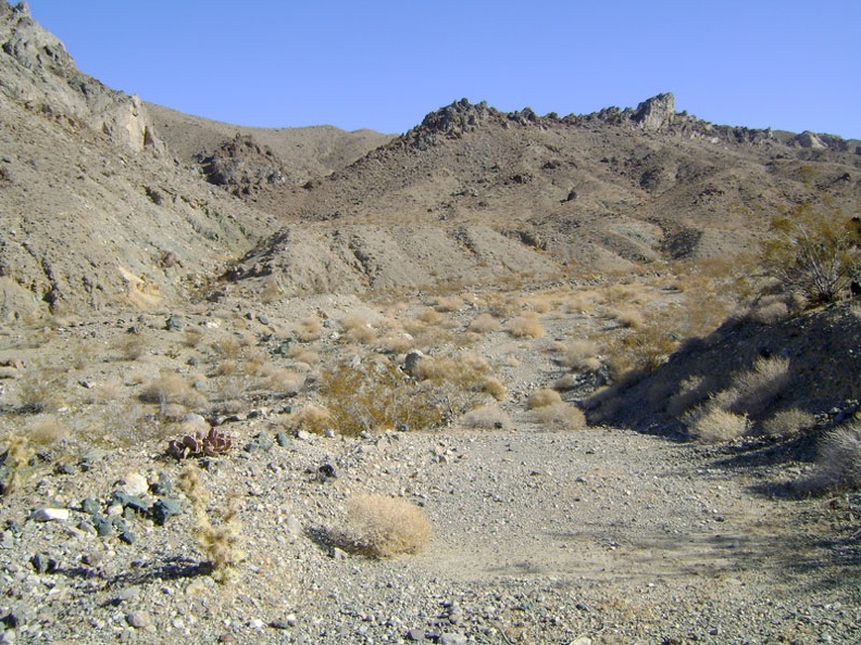 I walk around the bend into Old Dad Canyon and can no longer see back down to the valley floor below