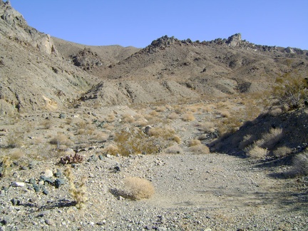 I walk around the bend into Old Dad Canyon and can no longer see back down to the valley floor below