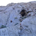 Up the steep rock hillside above Old Dad Canyon are scattered numerous small caves