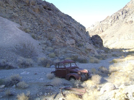 A little further down the wash, I pass by the old truck again