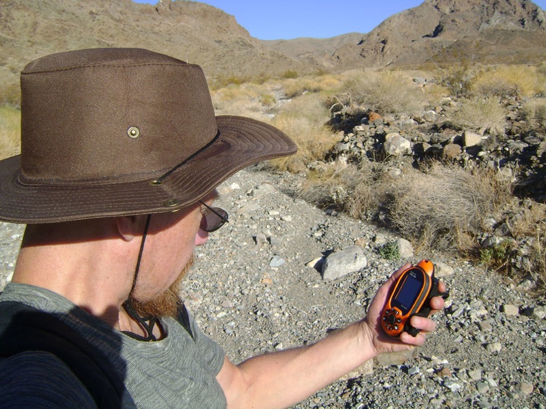Down in the unnamed wash north of Old Dad Canyon, I do a map and GPS check