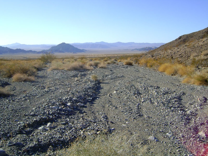 I decide to follow a U-shaped route from here down the wash and around the hills to get to the road leading up Idora Mine Canyon