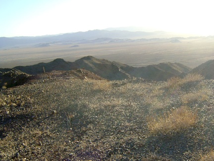 At the summit of Idora Mine Canyon, at about 2500 feet elevation, is a flat area, perhaps flattened by mining